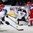 MINSK, BELARUS - MAY 11: Finland's Mikko Koskinen #31 attempts to make the save on Russia's Alexander Kutuzov #14 while Nikolai Kulyomin #41 and Tuukka Mantyla #18 look on during preliminary round action at the 2014 IIHF Ice Hockey World Championship. (Photo by Andre Ringuette/HHOF-IIHF Images)

